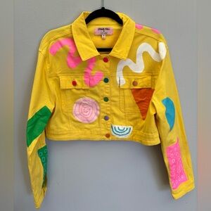 Funky cool yellow jacket with abstract designs by Dolls Kill x Zig Zag
